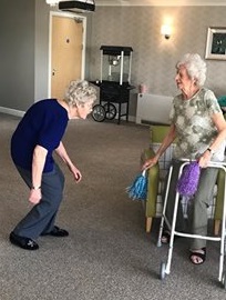 Pam and Betty dancing at a recent party